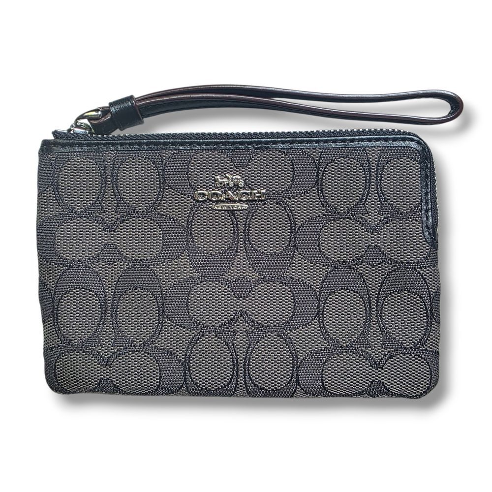 Coach Corner Zip Wristlet In Signature Canvas